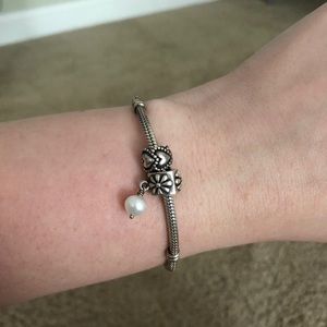 Pandora bracelet with two charms